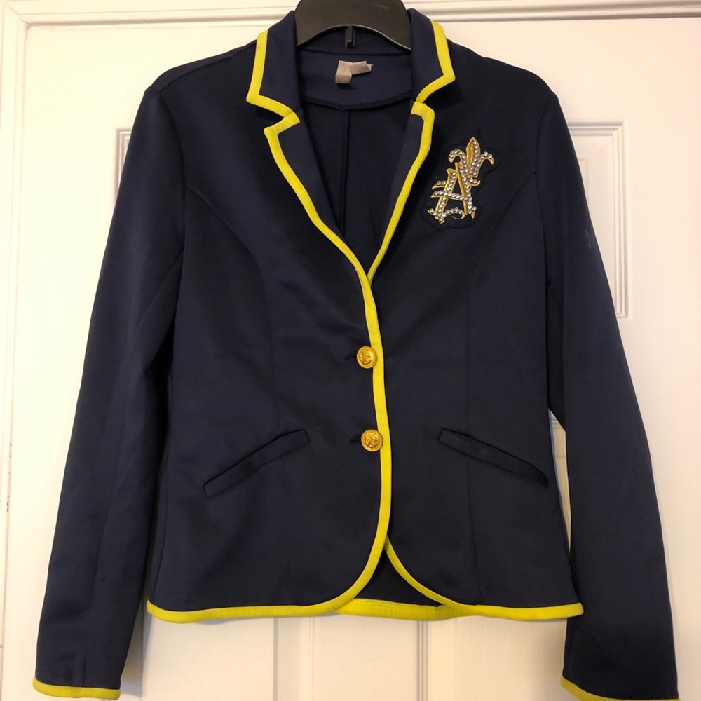 Navy blue blazer with A’ pen.